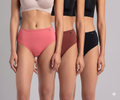 Three women wearing different colored high-waisted bikini bottoms on a gray background